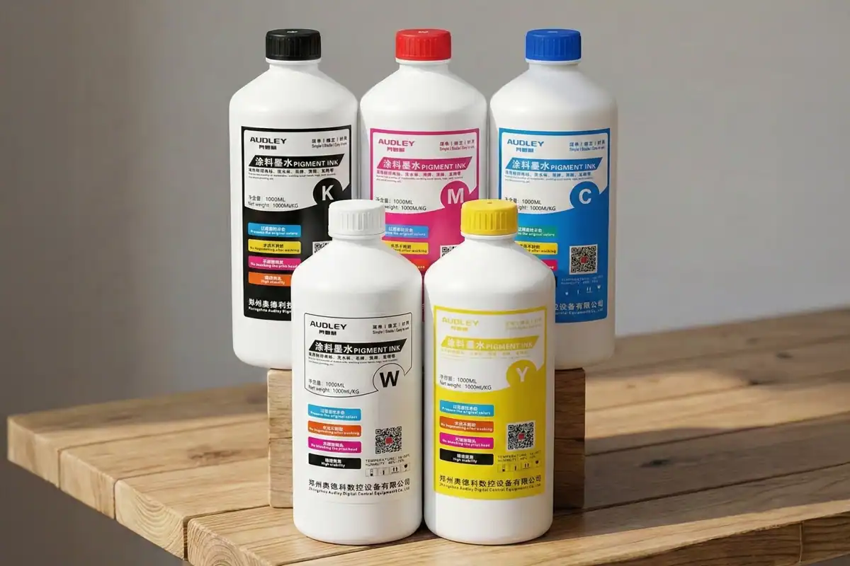 CMYK plus White DTF ink bottles